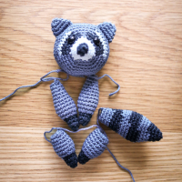 Wasbeer Onesiegurumi